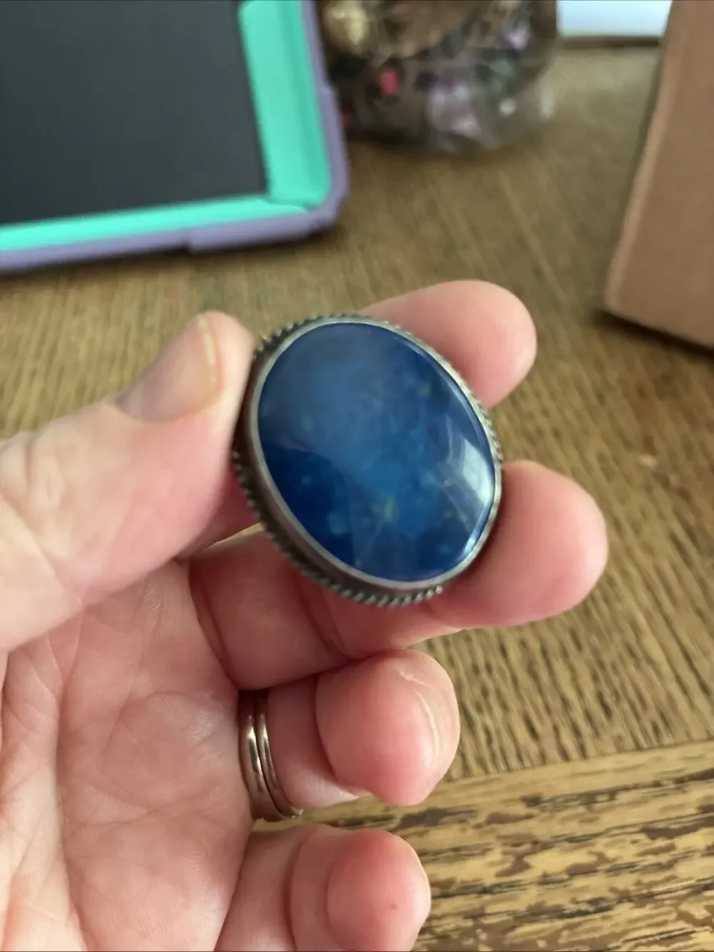 A Vintage Navajo Sterling Silver Sand Cast Brooch With A Lapis Cabochon